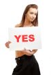 lovely girl holding yes board