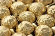 Chocolate sweets in golden foil