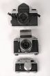 Three photo cameras