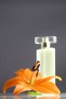 composition with a perfume and lily