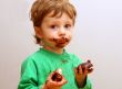 The boy eats a zephyr