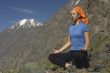 Meditating girl in the mountains 05