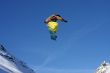 Snowboarder jumping high in the air