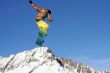 Snowboarder jumping high in the air