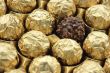 Chocolate sweets in golden foil