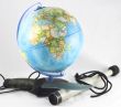 globe and a spyglass