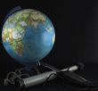 globe and a spyglass