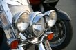 Three chromeplated headlights.