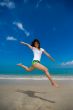 happy jump at the beach