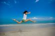 happy jump at the beach