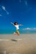 happy jump at the beach