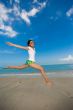 happy jump at the beach