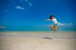happy jump at the beach