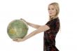 Young woman with  globe