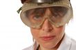 young lady technician in safety goggles