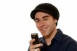 Young man texting on mobile phone