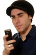 Young man texting on mobile phone