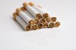 Cigarettes on reflective surface