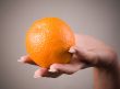 Orange on a hand
