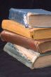 Old books and magnifier