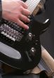 Hand on a guitar
