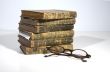 antique books and glasses