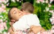 happy mother and son with flowers