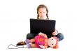 Blond child with doll and notebook