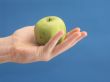 hand to hold apple