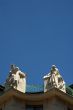Prague rooftop statues on historic building