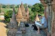 tourist reading map on temple background