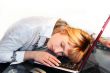 woman is sleaping on the work