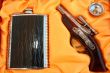 Pistol and flask