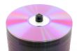 Close-up of purple DVDs on spindle