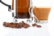 Cup and coffee pot and beans