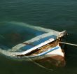 old sunken rowing boat