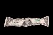 crumpled dollar