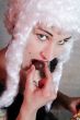 woman eats sweet
