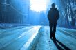 alone silhouette on the winter road