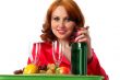 woman with fruits and some wine