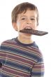 child eating chocolate