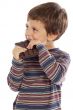 child eating chocolate