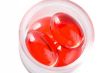 red capsule pills isolated