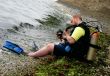 Diver on a beach after submergence