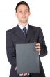 business man holding a book