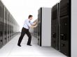 Business man adding server to network
