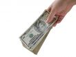 Hand with dollars