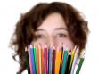 beautiful girl holding color pencils
