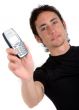 casual guy showing his mobile