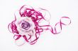violet artificial rose convoluted in purple tape 1